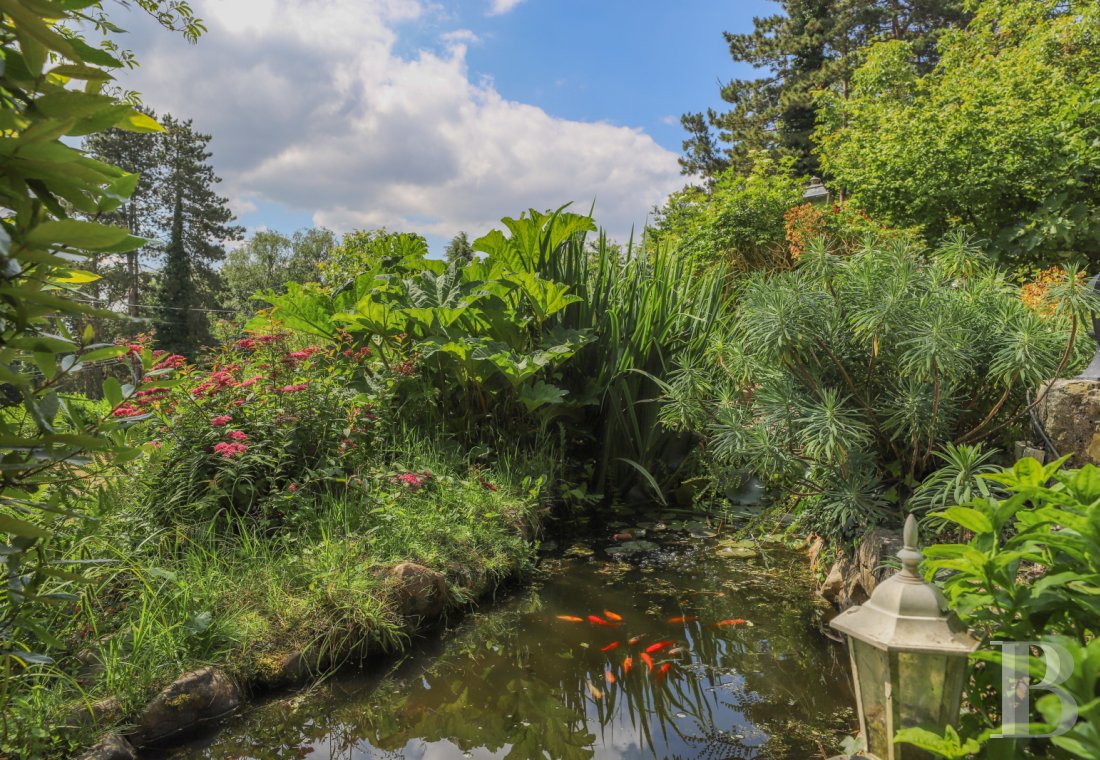 En Normandie, dans le parc régional des Boucles de la Seine, une villa de style anglo-normand - photo  n°6